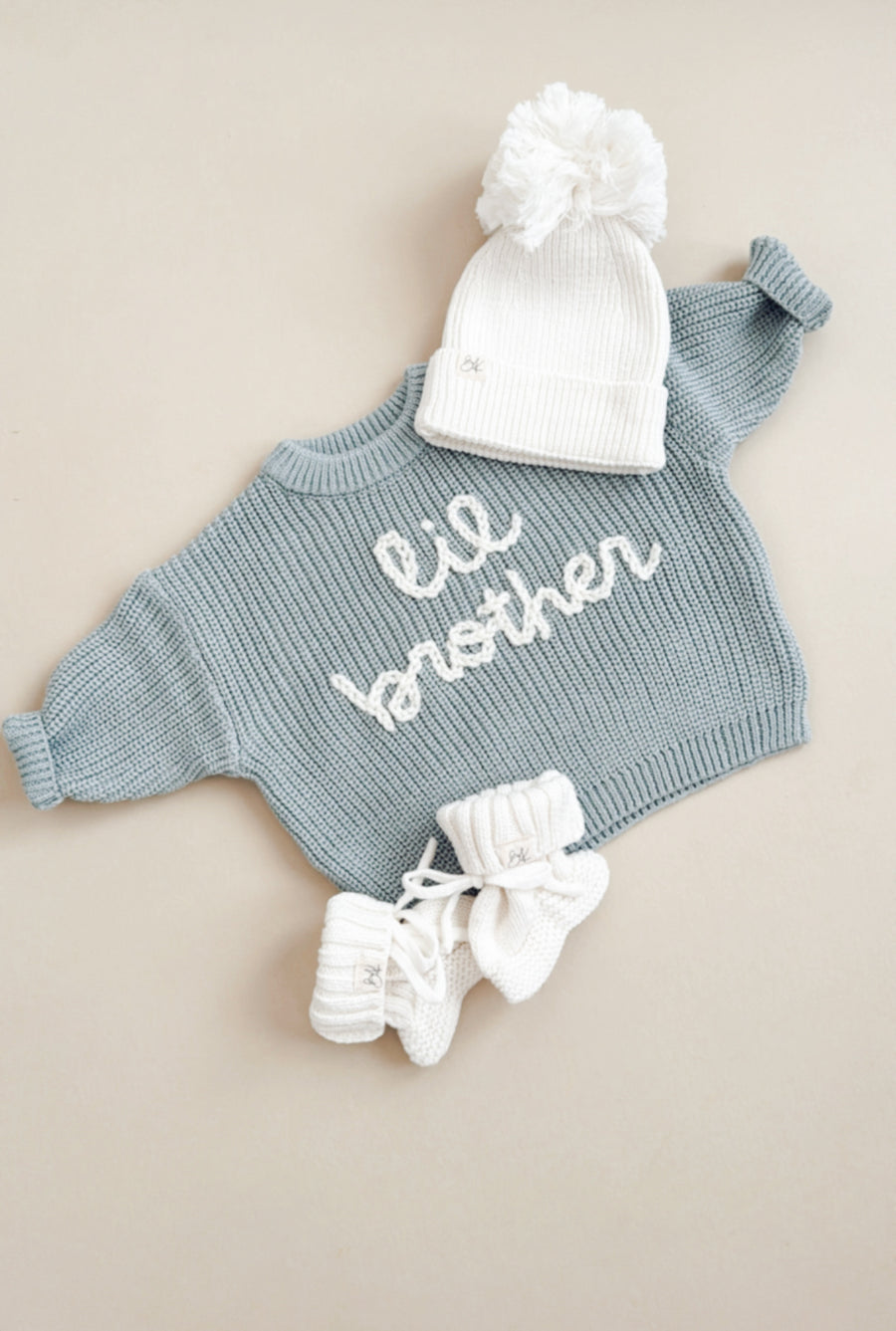Knit Booties and Pom Beanies