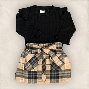 Felicia | Black top + plaid skirt